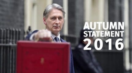 Chancellor Phillip Hammond holding red case before Autumn Statement 2016