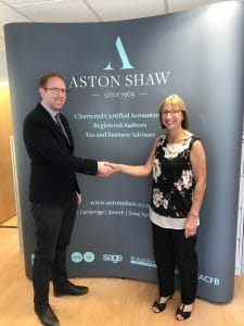 Chris Lock from Aston Shaw shakes hands with Jill Page