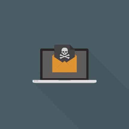 Laptop With Skull Sign On Black Document Over Yellow Envelope