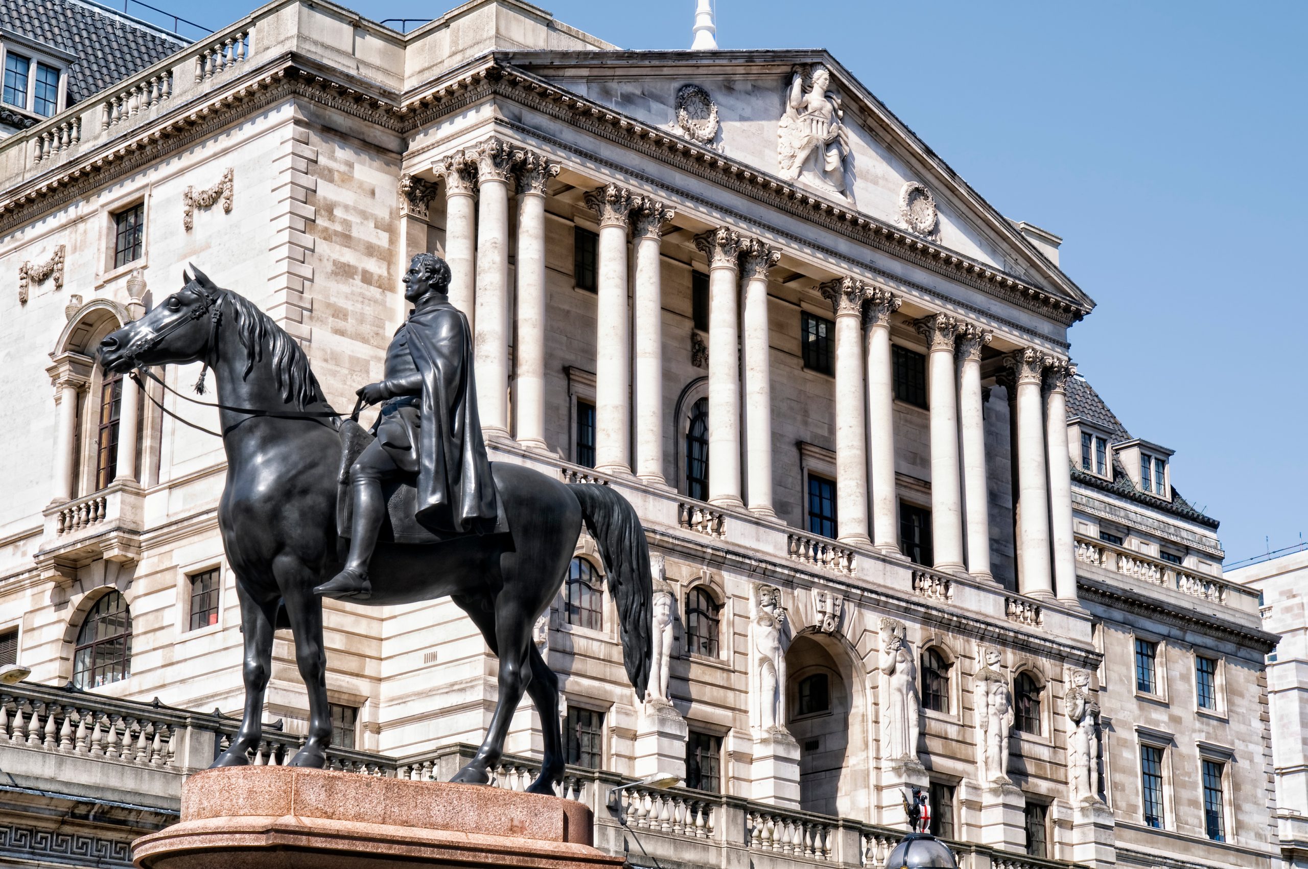Bank of England building with a statue of a man riding a horse